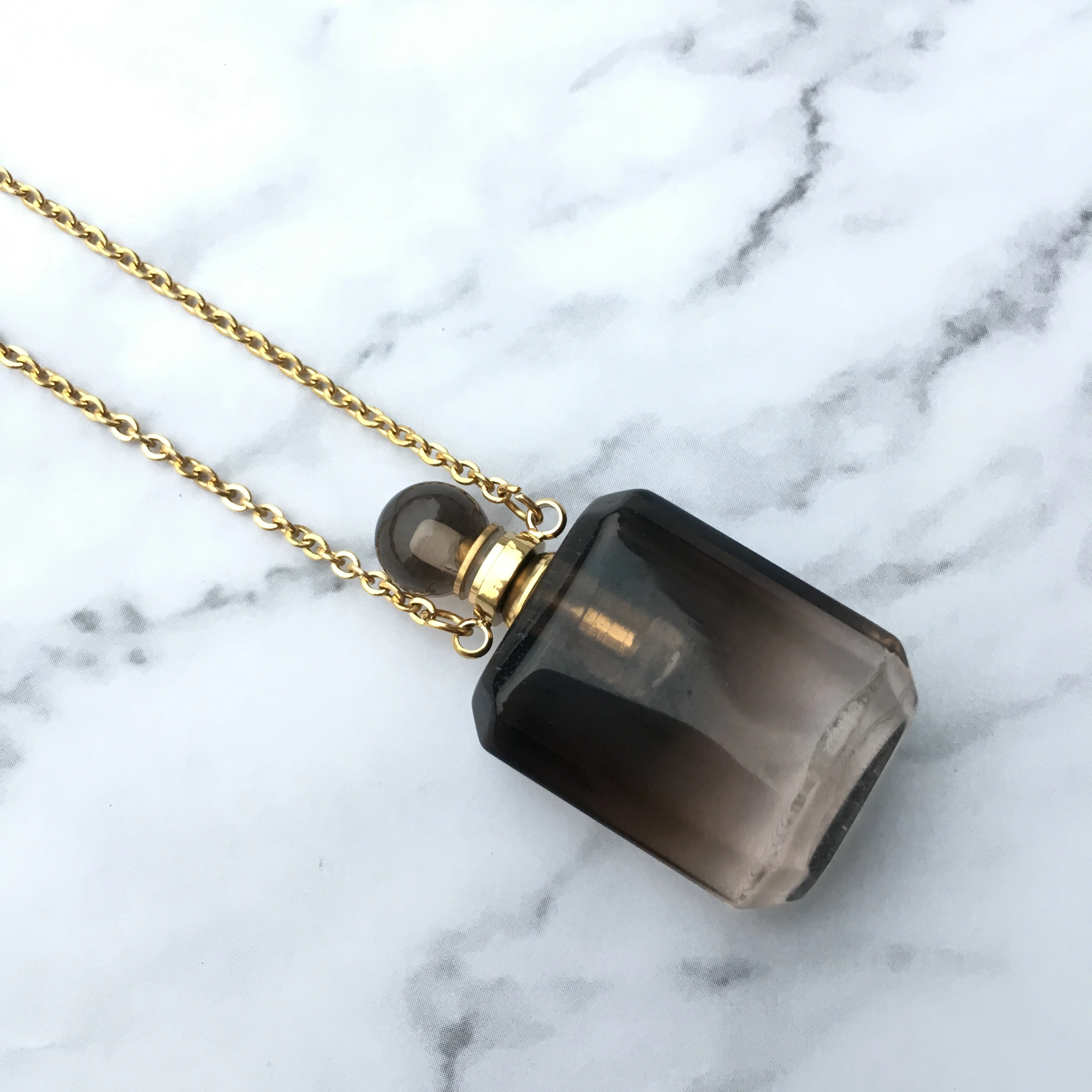 

Black Translucent Texture Necklace Crystal Perfume Bottle Essential Oil Diffuser Double Buckle Necklace perfume bottles.