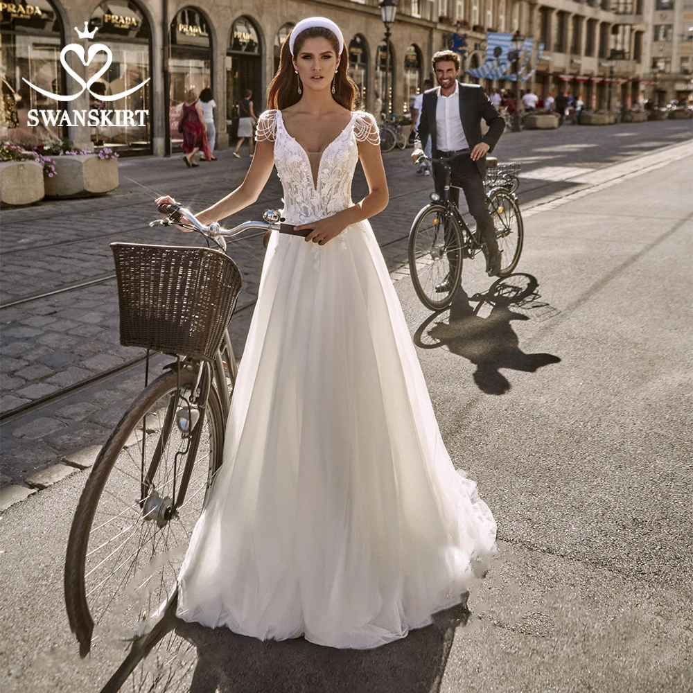 

Fashion V-neck Sleeveless Wedding Dress Swanskirt PZ27 Beaded Appliques A-Line Backless Princess Bridal Gown Vestido de novia