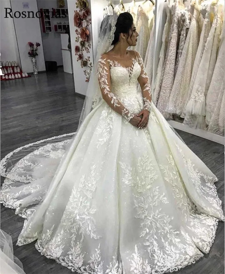 

Ball Gown Princess Wedding Dresses 2020 Scoop Long Sleeves Cover Button Back Lace Appliques Long Bridal Gowns Vestido de Noiva