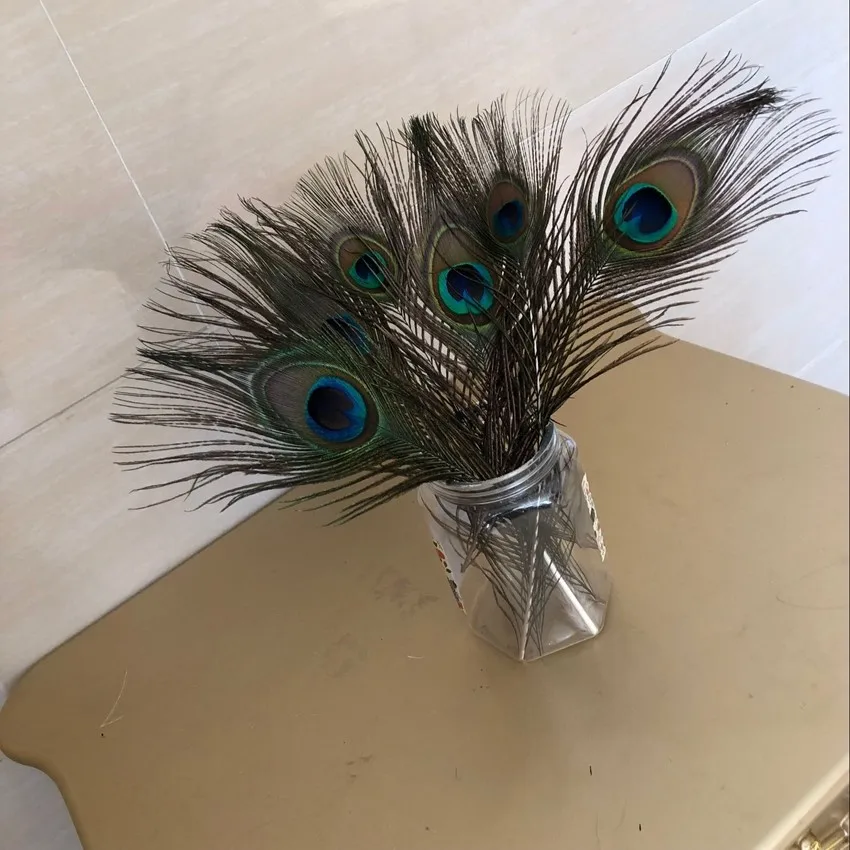

Top quality peacock feathers 100Pcs/lot, length 35-50CM beautiful natural peacock feather Diy jewelry Decorative Decor fittings
