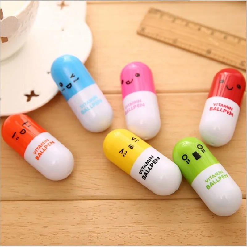 wholesale Cute pill ballpoint pen Student stationery cartoon expression inflatable pen Capsule pen - Color: send random