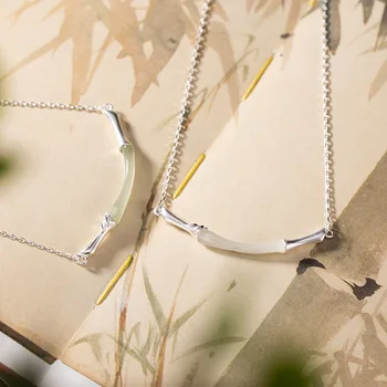 

S925 pure silver inlay hetian jade white jade bamboo frosted female character joker collarbone chain chain pendant