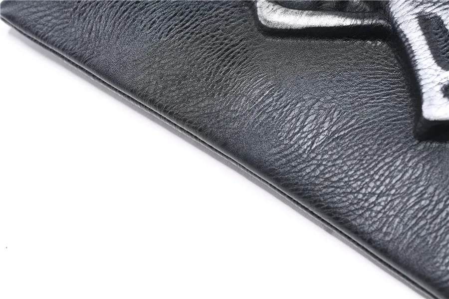 Personality pattern three-dimensional street leather wrist bag Korean version of fashionable men's hand bag