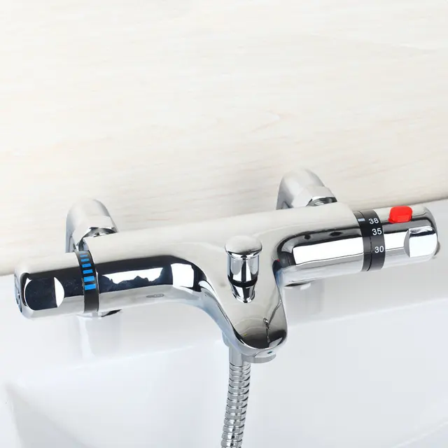 ทองเหลืองดาดฟ้าติดตั้งวาล์วผสม Thermostatic อุณหภูมิคงที่ควบคุมสองอ่างอาบน้ําก๊อกน้ําแตะเทอร์โมวาล์ว TR533 2