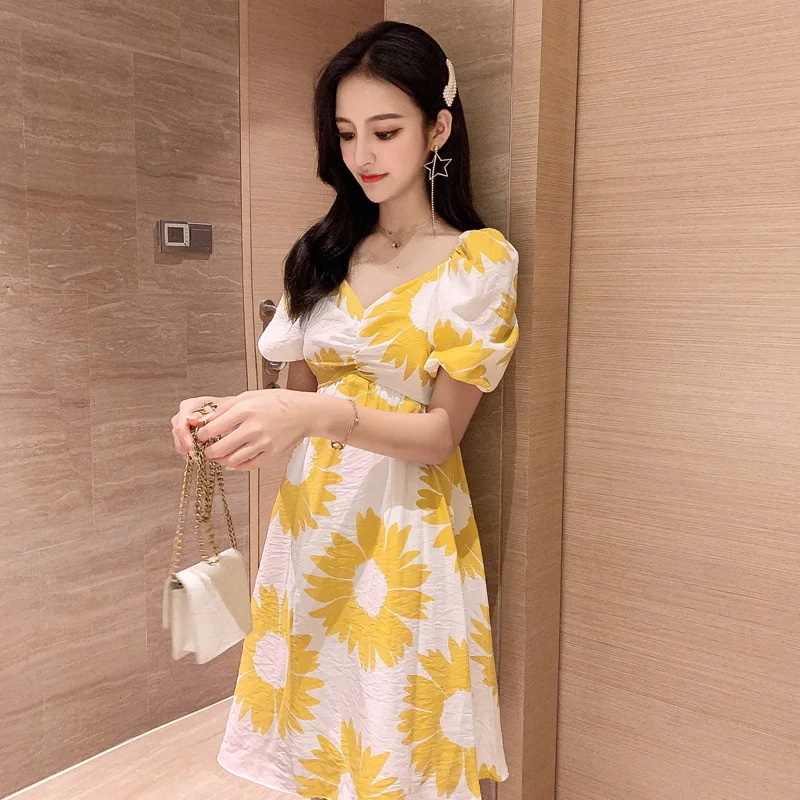 

2019 summer new dress female fashion simple sunflower decoration cotton and linen comfortable casual dress