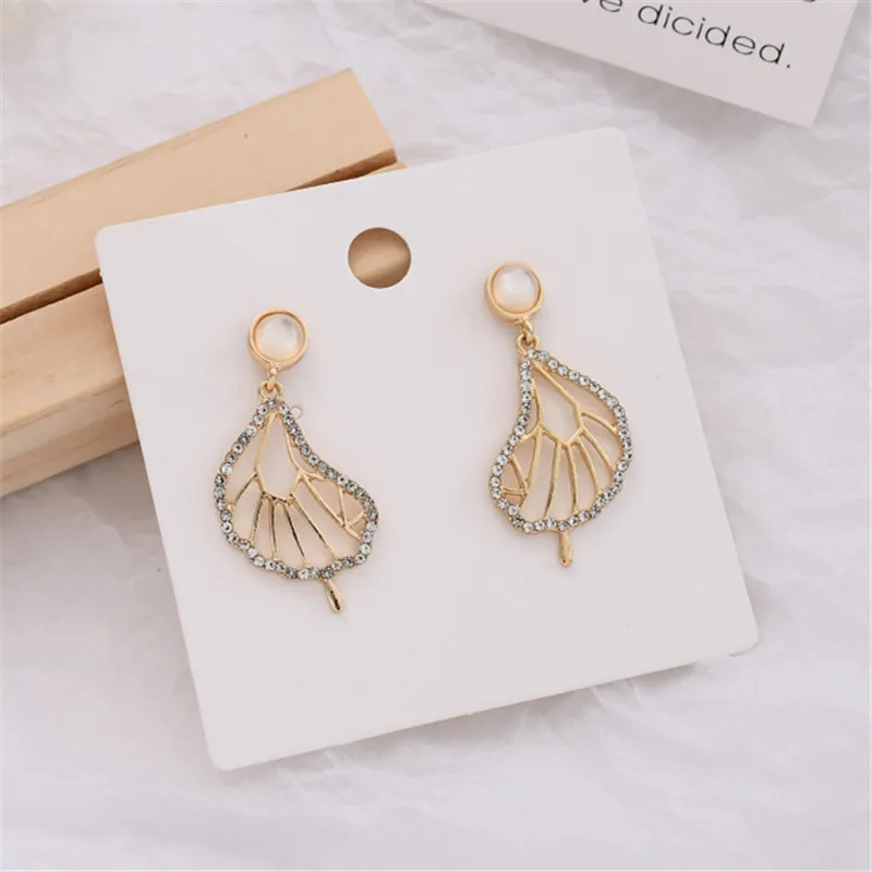 Серьги в виде асимметричных листьев винтажные круглые серьги-гвоздики с опалом