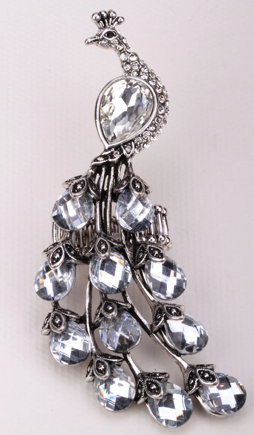 Женское длинное эластичное кольцо с кристаллами золотистого и серебристого