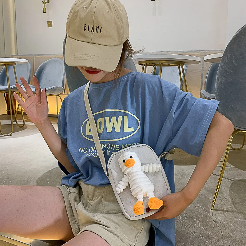 

2019 new JIULIN high-quality Japanese and Korean style new canvas cartoon doll Messenger shoulder women bag chest bag