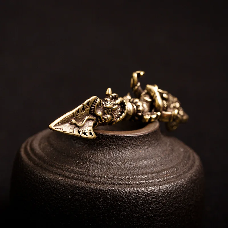 brass vajry charms (2)