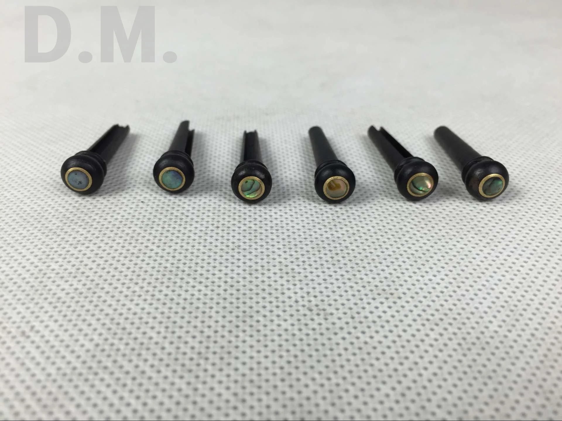 Factory Direct Selling Customizable Top Grade Guitar Strings Cone Ebony Material zhen bei Solid String Nail Black And White with