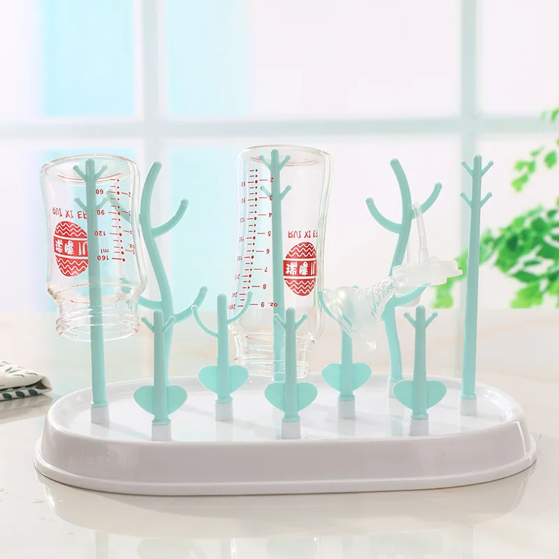 

Hot Selling Mom And Baby Bottle Drying Rack Portable Glass Drying Rack Creative Bottle Drying Rack Pacifier Draining Shelf