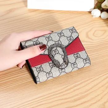 

2020 Women 's PU Purse Women 's Short Style Fashion Multi-Card Three Fold Contrasting Color Buckle Trade Wallet Leather Bag