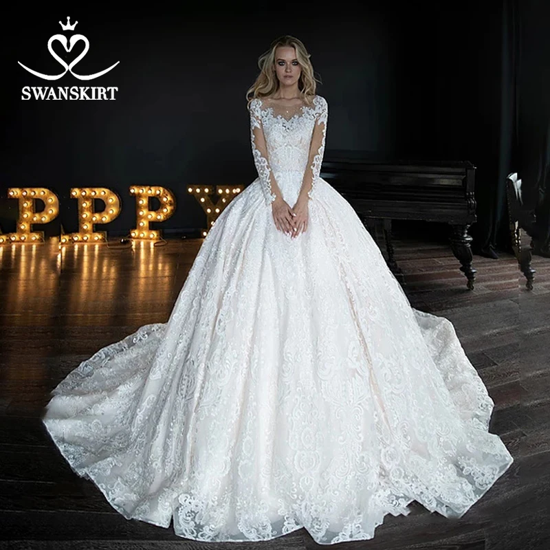 

Luxury Long Sleeve Wedding Dress Swanskirt HZ02 Appliques Bling Vestido de novia Beaded Ball Gown Chapel Train Bridal Gown