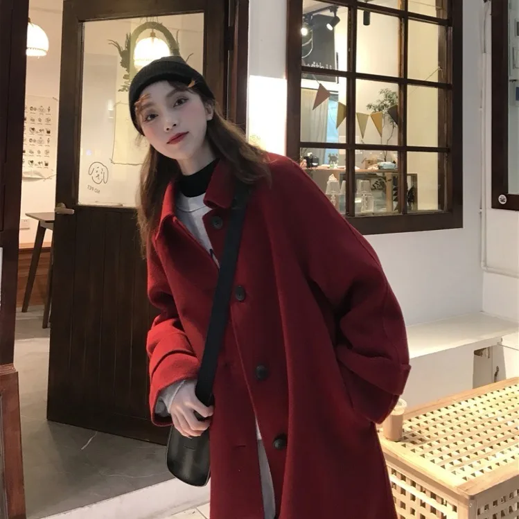 

Spring and winter new retro bf wind woolen coat female Korean loose student windbreaker long thick coat tide