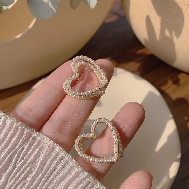 

Simple Gold Double Heart Pearl Korean Earrings For Women Fashion Statement Pearl Stud Earrings Party Jewelry Trendy Accessories