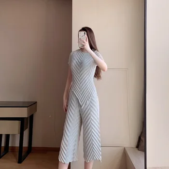 

Two Piece Set Women Plus Size Summer 2020 New Stretch Miyake Pleated Fashion Simple Irregular Tee Top + Straight Pants Suit
