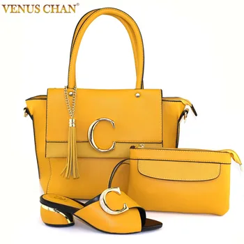 

New products are on the shelves of Italian fashion shoes and PU leather bag suits, gold fasteners, yellow color
