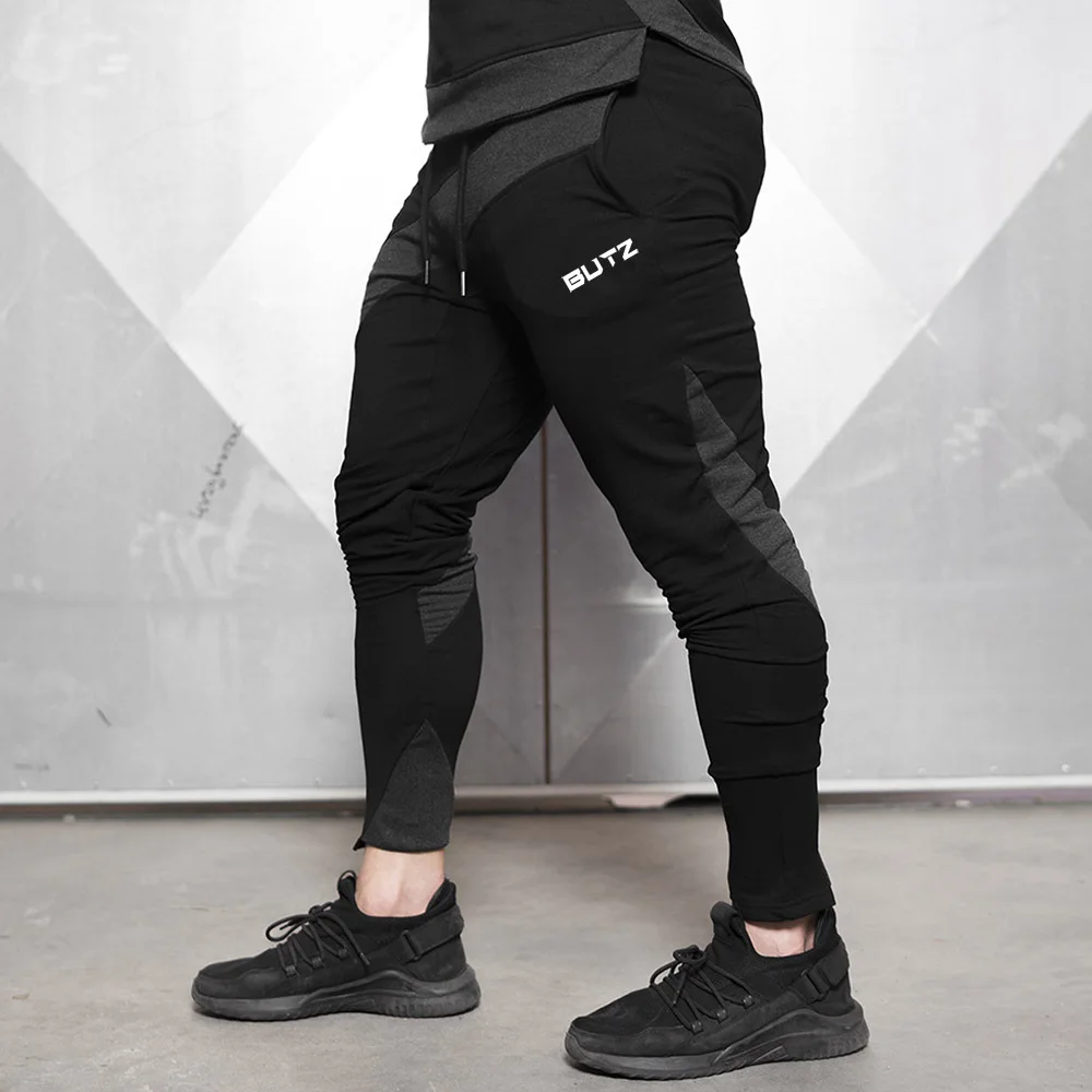 

Men Compression Muscle Popular Brand New Sports Fitness Trousers Men Stitching Running Training Breathable Pants Exercise Pants