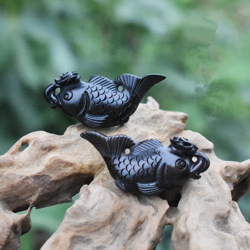 

Natural ebony, hand-made carvings, peony fish, decorations ornaments.