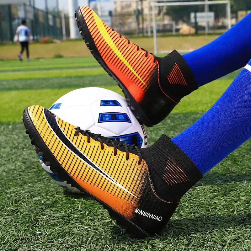 fg soccer cleats on turf