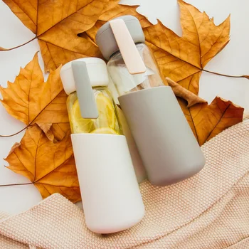 

Simple Solid Color Heat-resistant Anti-ironing Glass Transparent Borosilicate Cup with Rope 400ml Large Capacity Portable Bottle