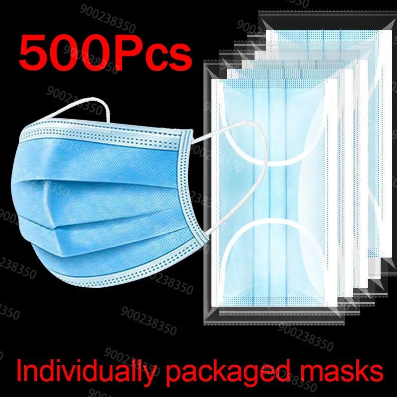 Masques chirurgicaux Type IIR bleus en gros plan, montrant les trois plis et les élastiques blancs.