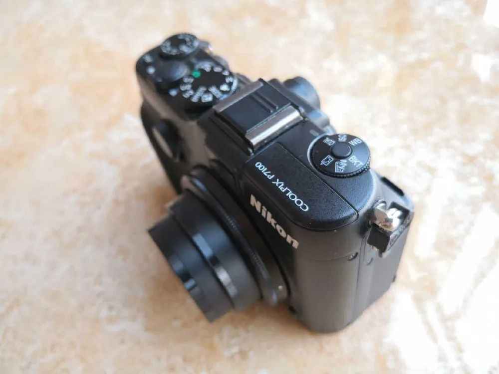 USED Nikon COOLPIX P7100 10.1 MP Digital Camera with 7.1x Optical Zoom NIKKOR ED Glass Lens and 3-Inch Vari-Angle LCD USED Nikon COOLPIX P7100 10.1 MP Digital Camera with 7.1x Optical Zoom NIKKOR ED Glass Lens and 3-Inch Vari-Angle LCD - point-shoot-digital-cameras, electronics, digital-cameras