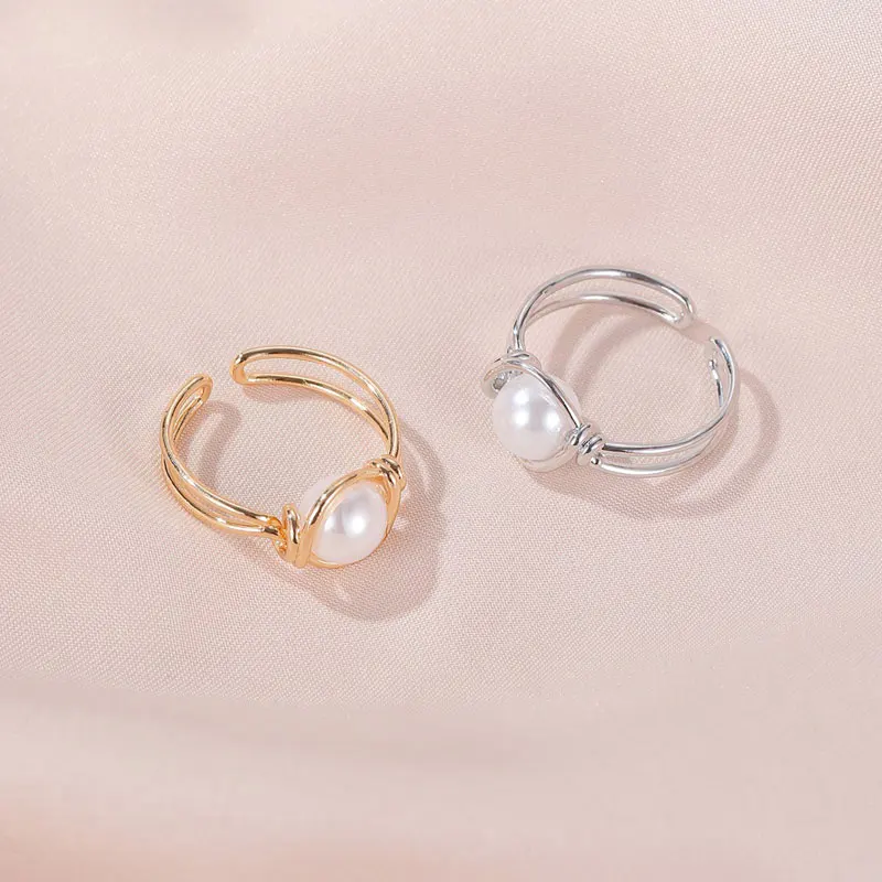 

Simple Sweet Elegant Pearl Lady Rings Personality Punk Knot Gold Hollow Out Alloy Ring Fashion Jewelry Gift For Women