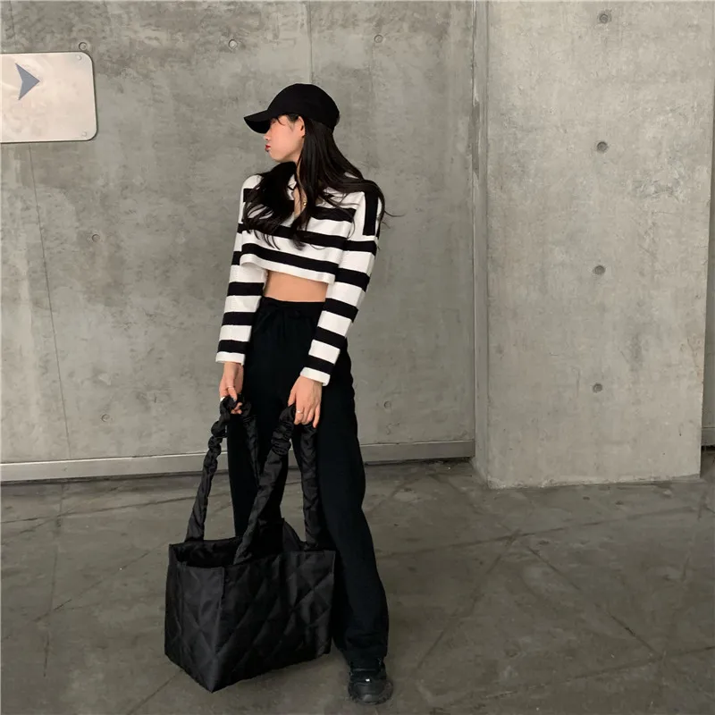 

2PCS Stripe split will firm offers to han edition in early spring show thin sweater leisure mop the floor wide-legged pants