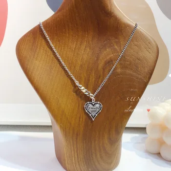 

South Korea's East Gate S925 pure silver love necklace female retro heart-shaped pendant retro 100-coat sweater accessory chain.
