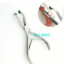 Плоскогубцы с зеленым резиновым наконечником стоматологические хирургические