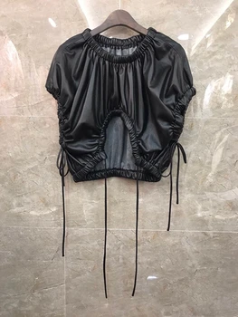 

2020 Autumn and Winter new women's wrinkle decorative round neck irregular tie PU Joker top 923