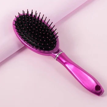 

Massage comb, color raspberry