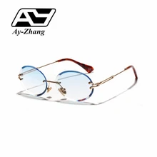 Ay-zhang стиль Модные Овальные Солнцезащитные очки без оправы для женщин и мужчин прозрачные синие линзы Солнцезащитные очки Модные Оттенки UV400