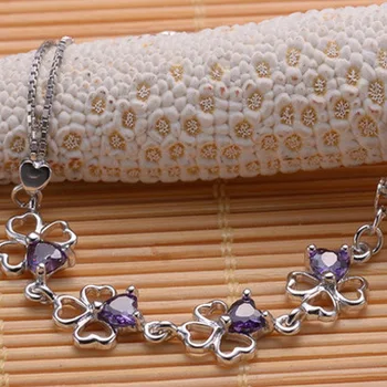 

silver clovers charm bracelet hand chain with 4 cubic zirconia