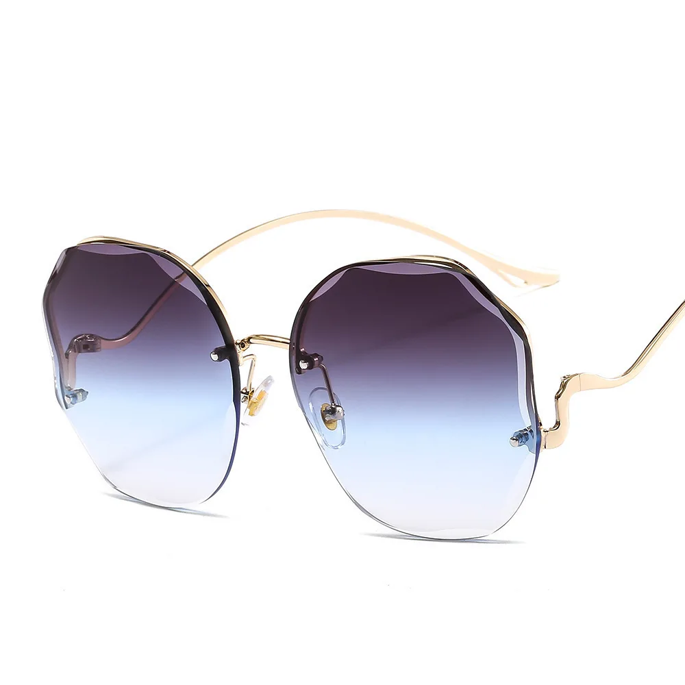 

High Quality Metal Frame Women's Sunglasses Marine Film UV Protection Frameless Wild Round Spectacles