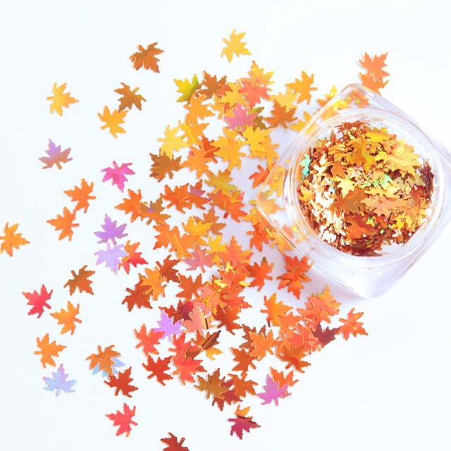 box with 12 styles of color laser maple leaf nail sequins Holographic Metallic Leaf Glitter Sequin Nail Art Patch Decoration