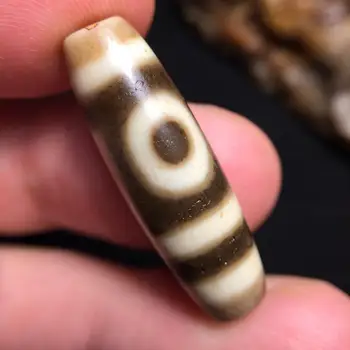 

Fine natural Tibetan golden hook and horns Ruyidimen Two agate dzi beads with obvious weathered yellow teeth color