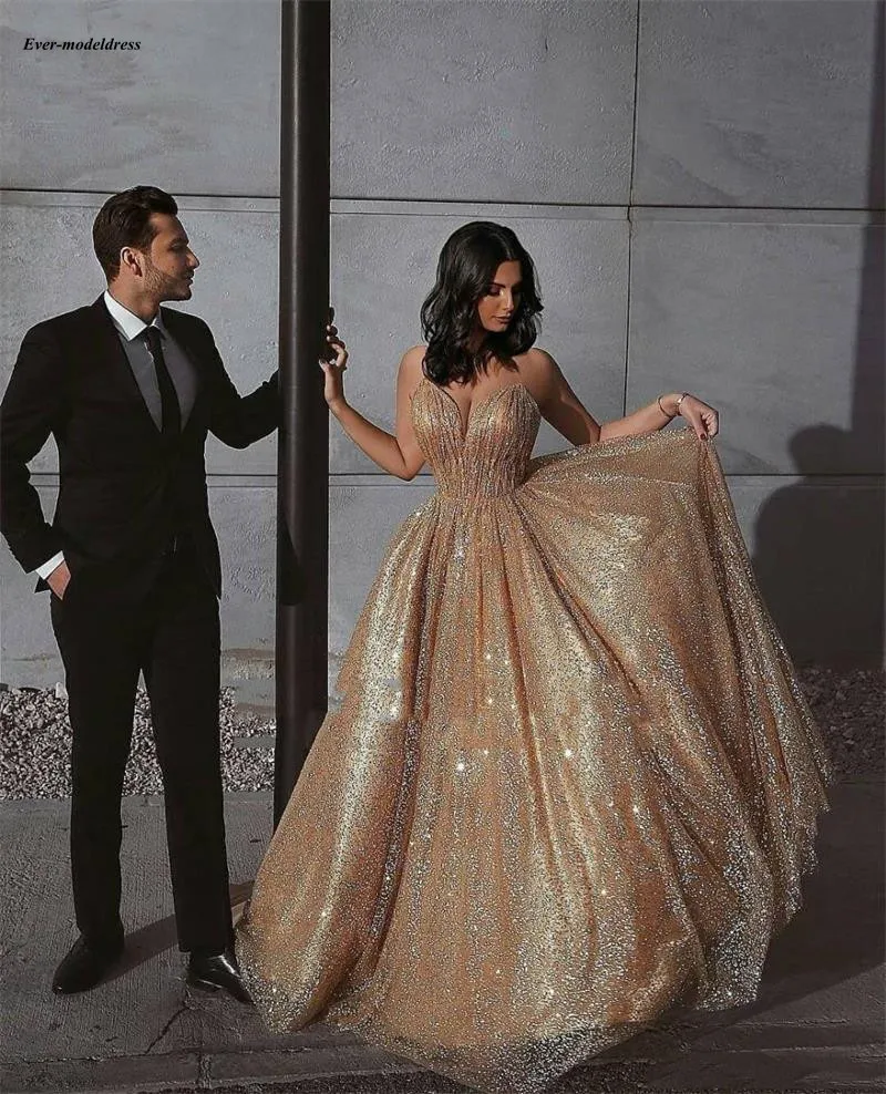 

Sparkly Saudi Arabic Evening Dresses 2019 Deep V-Neck Sleeveless Backless Dubai Formal Prom Party Gowns Customized Robes