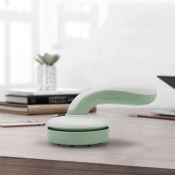 

USB portable mini vacuum cleaner Wireless portable hair remover car desktop handheld vacuum cleaner USB charging light fashion