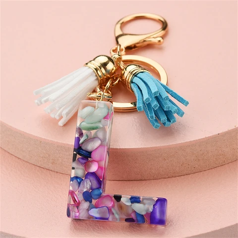 Women Keychains 26 Glitter Hollowed-out Words Handbag Tassel English Letter Keyring with Puffer Ball Charms Free Shipping