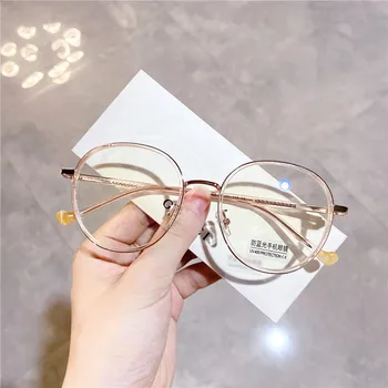 

M2014 Trend Anti-Blueray Eye-protection Goggles Circle TR Metal Mixed Eyeglasses Fixing Device Material Mirror Leg Myopia Frame