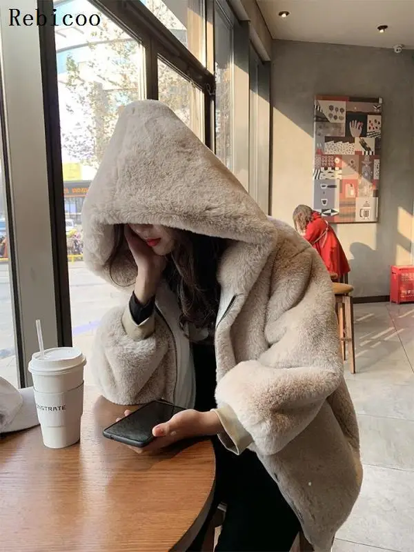 Женское длинное плюшевое пальто элегантное розовое из искусственного меха