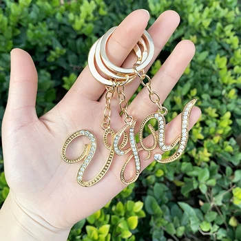 

KOMi Initial Letter Keychain Circle Chain Crystals 26 Letter Key chains Hollow Alloy Daily Travel Gift Pendant Брелок K1773