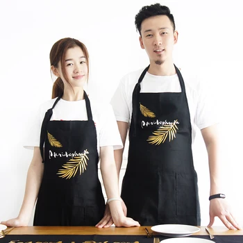 

Korean version of the fashion bronzing leaves apron home coffee shop overalls men and women home kitchen couple models