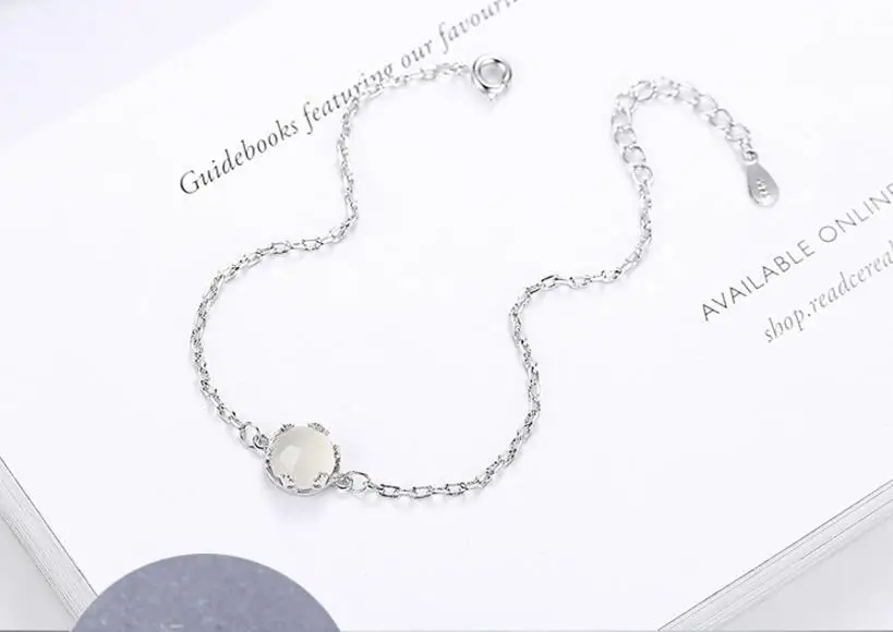   ü  Į    &  pulseira