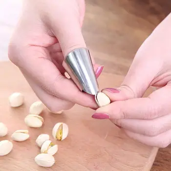 

Dropship Peeling Bean Artifact Iron Nail Set Dialing Horny Beans Pine Nut Pistachio Peeling Tool Anti-cutting Finger Protector