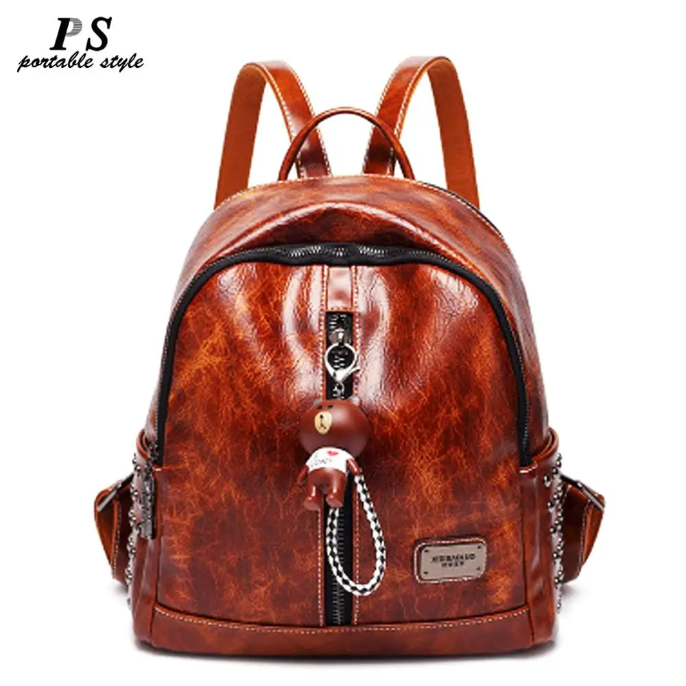 designer purse backpacks