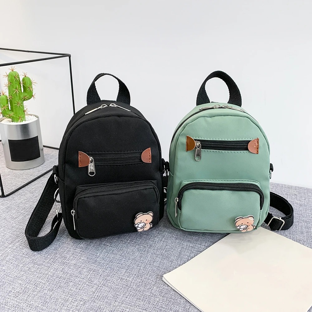 Mochila pequeña informal de lona para mujer, bolsos de hombro tipo bandolera Vintage de Color sólido, Mini bolso escolar para estudiantes