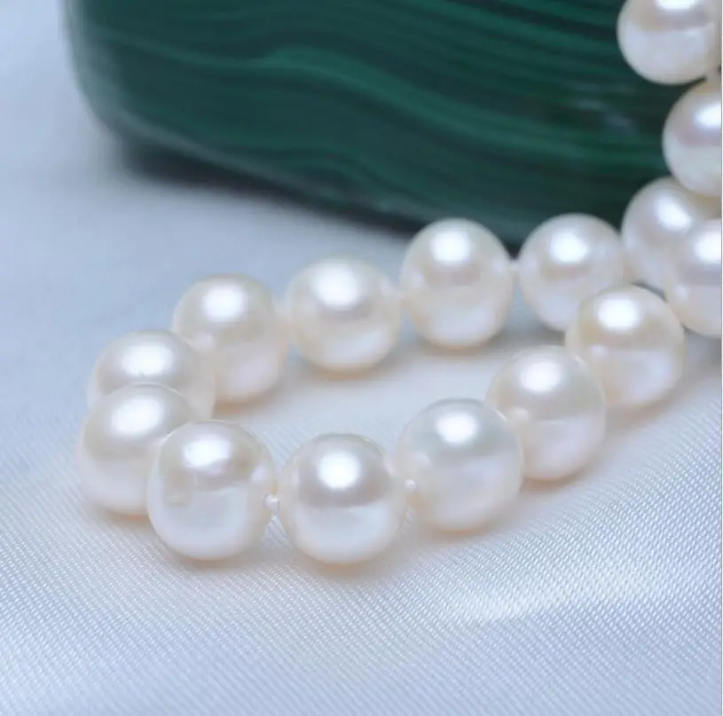 413+9-10 blemish nearly round pearl necklace